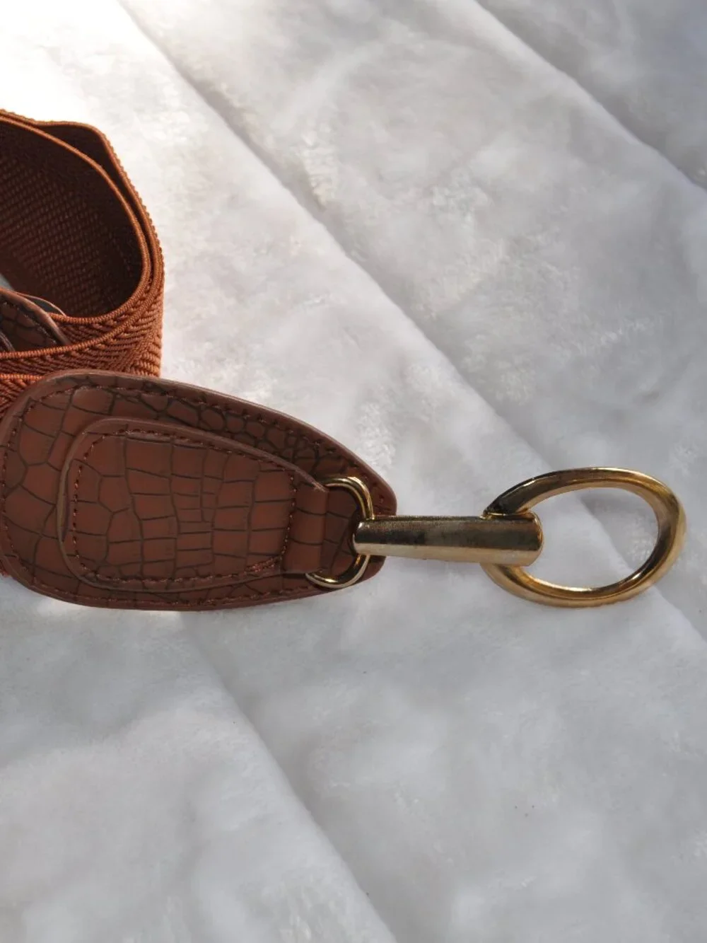 Women's brown Vince Camuto faux leather elastic wide belt features a gold circle